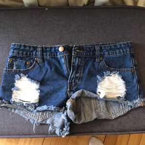 Distressed denim shorts